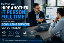 Business professionals discussing IT consulting services and business technology strategy in a modern office environment