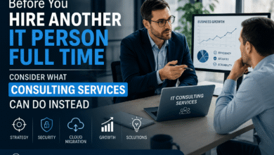 Business professionals discussing IT consulting services and business technology strategy in a modern office environment